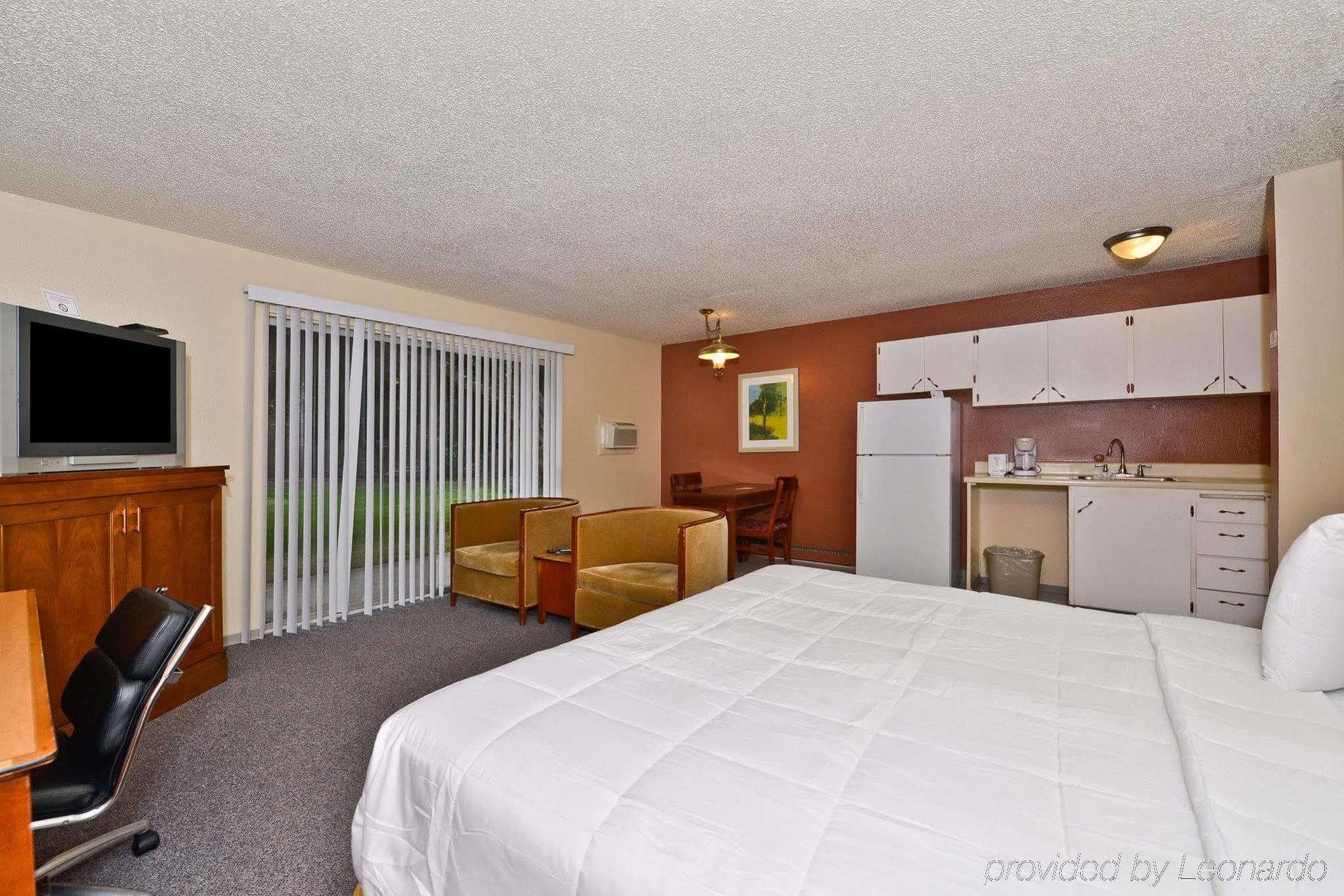 توكويلا Sunrise Garden Suites الغرفة الصورة