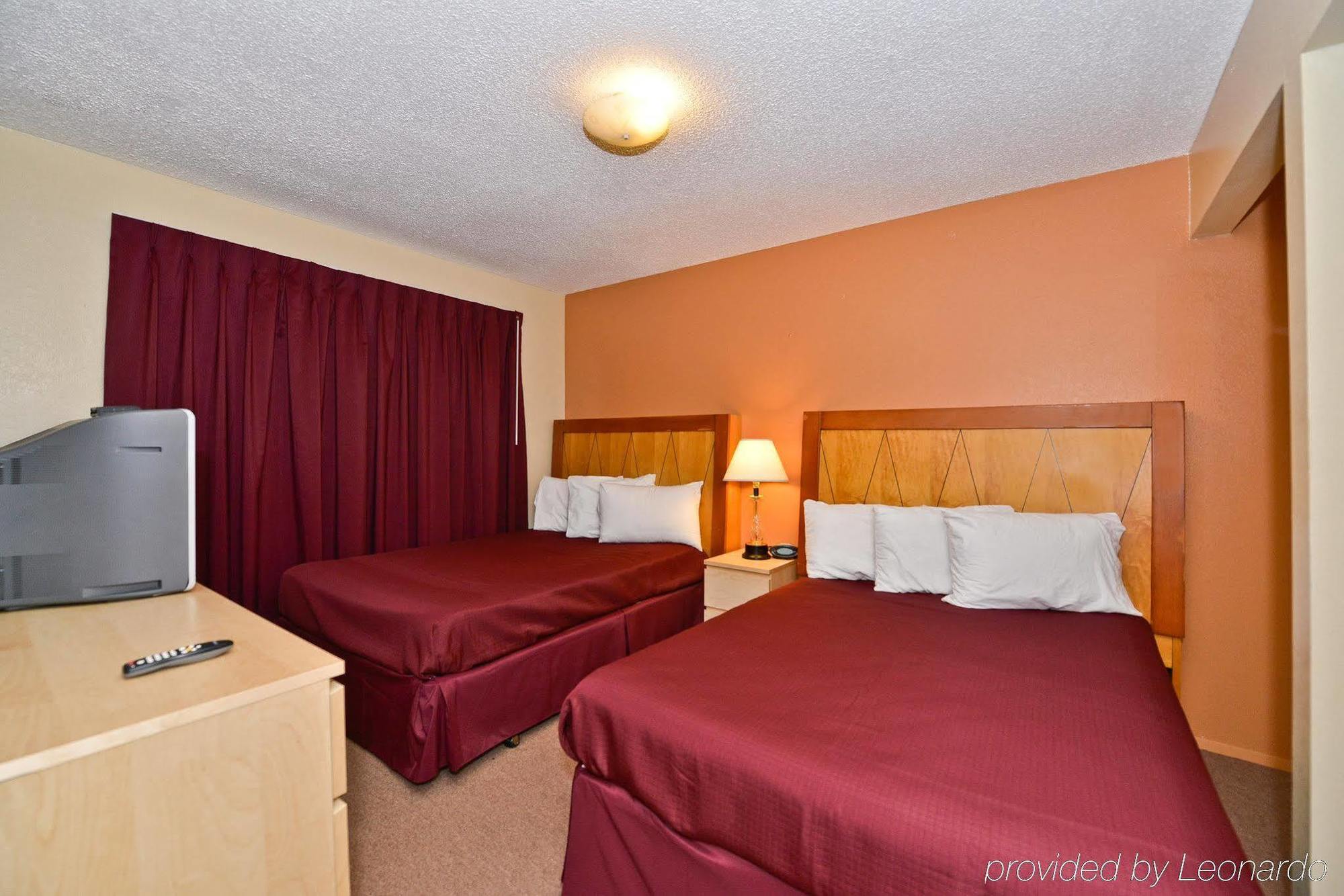 توكويلا Sunrise Garden Suites الغرفة الصورة