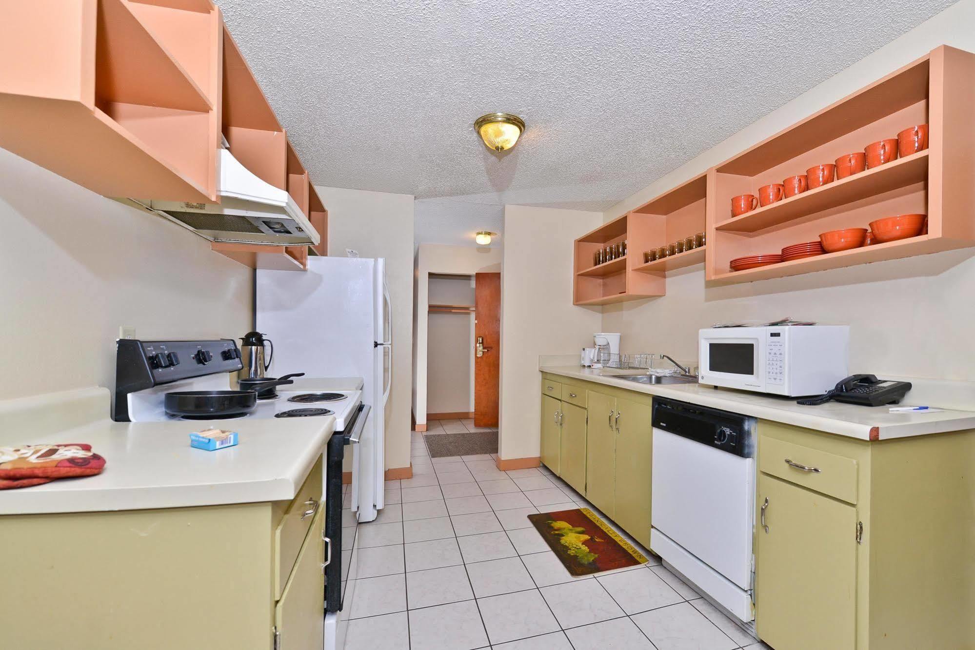 توكويلا Sunrise Garden Suites الغرفة الصورة