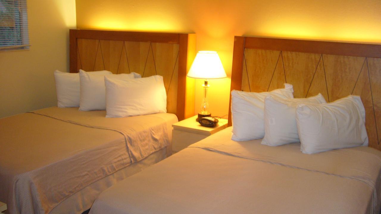 توكويلا Sunrise Garden Suites الغرفة الصورة